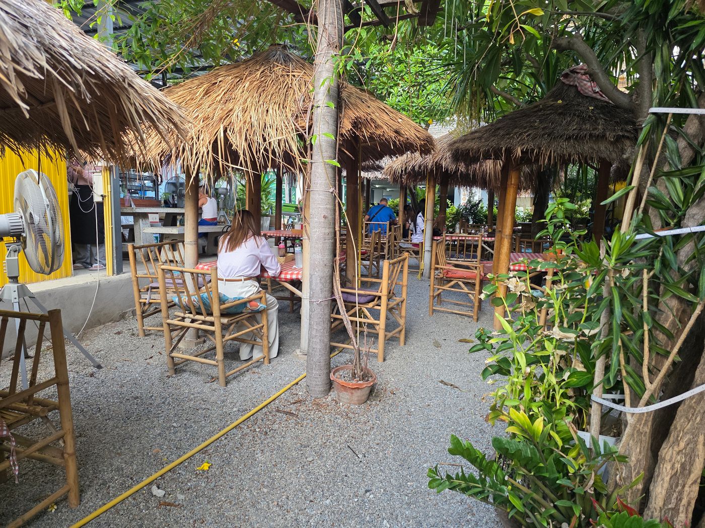 A garden restaurant in Pattaya, Thailand, with local dishes priced from 60 to 160 baht